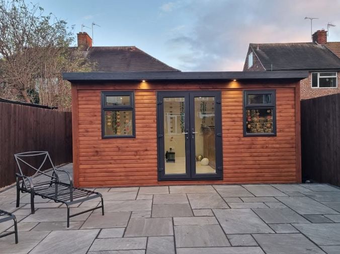 Ideal Garden Rooms — completed garden room at dusk